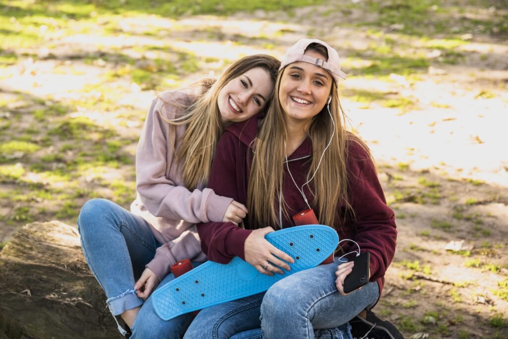 Brighten Her Day with these Good Morning for my Sister Quotes 5 young females sitting outdoors 1 good morning for my sister