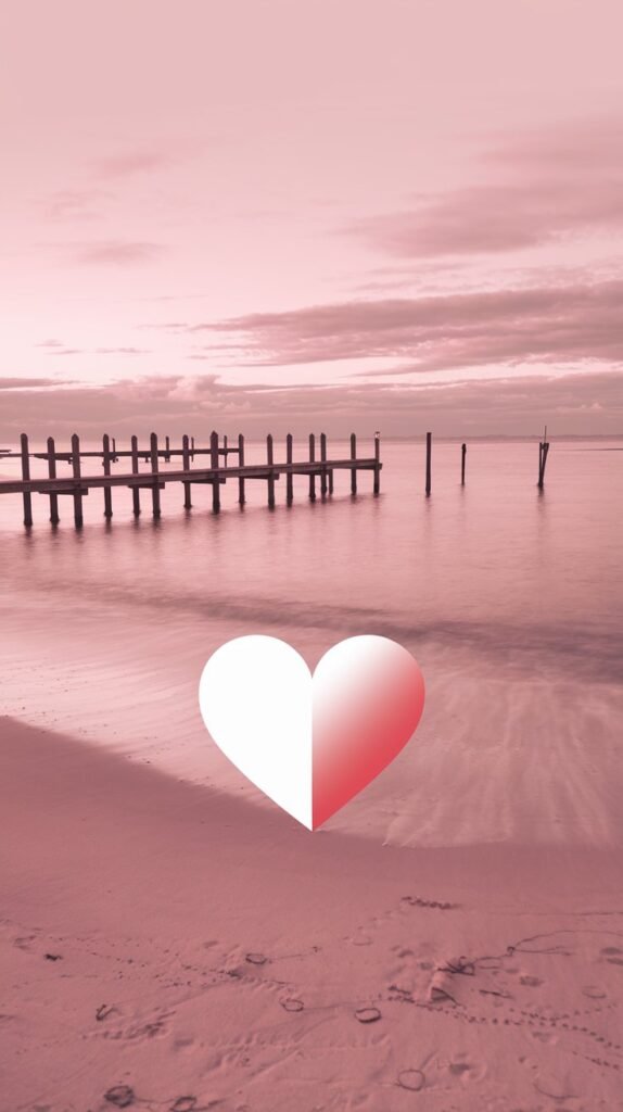 Refresh Your Space with Stunning 10+ Pink Wallpapers 9 a serene coastal scene with a soft light StUSExkSzWOzJ35m4syfQ AL79m2FPSWqu p9LgMjJDQ