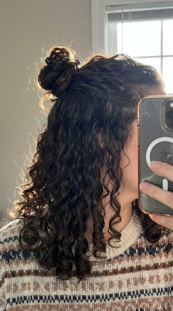Half up curly bun 202604211723