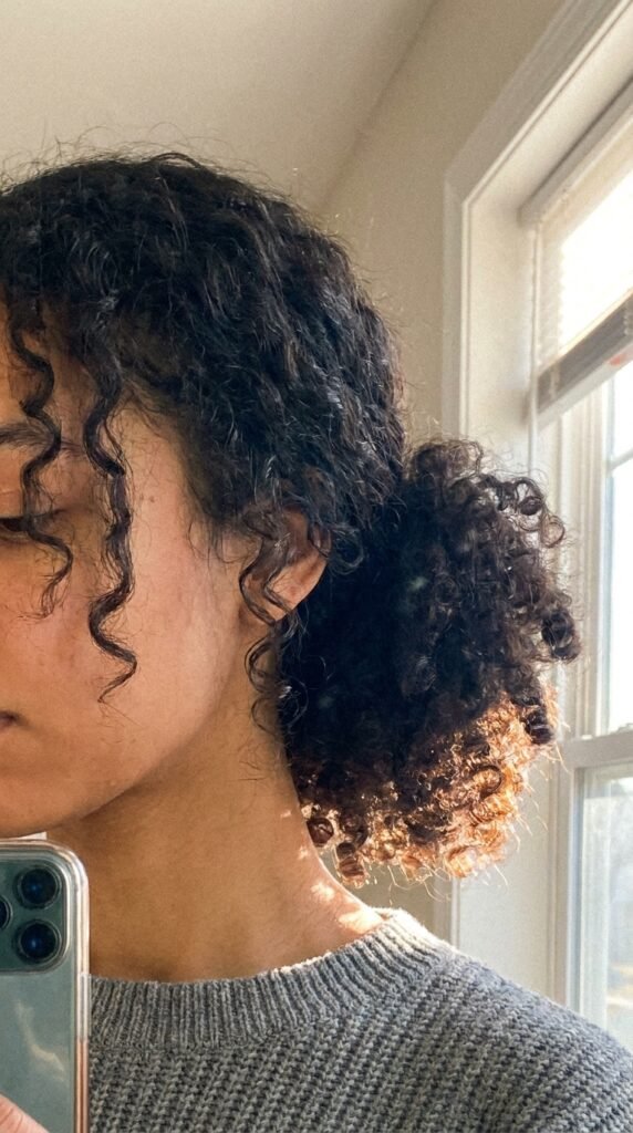 Low curly puff 202604211724