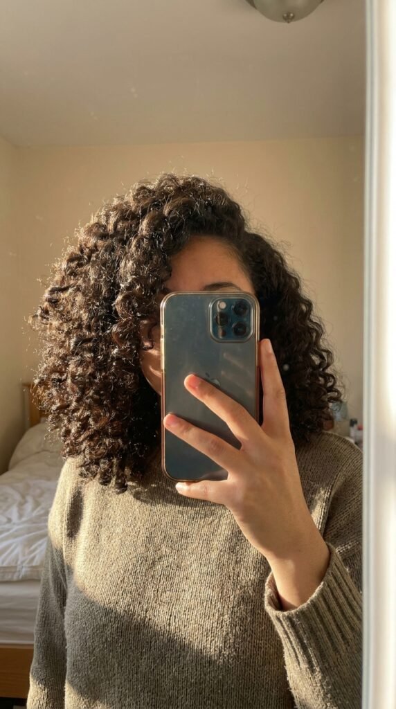 Side parted curly volume 202604211726