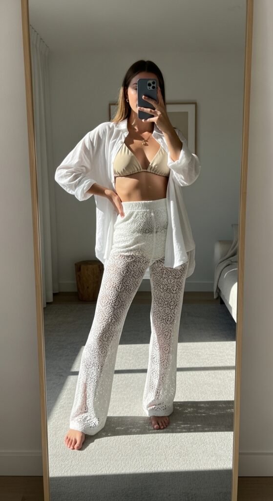 Woman wearing white crochet pants 202605251815