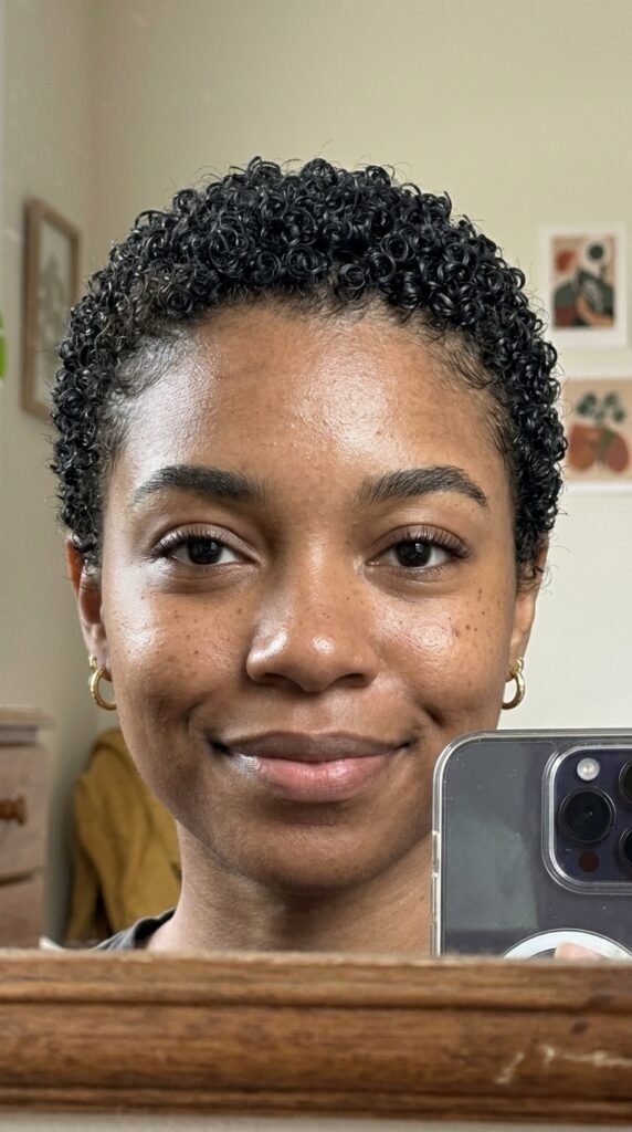 12 Buzz Cut Hairstyles Women Are Loving Right Now 7 Woman taking iPhone selfie 202606202255
